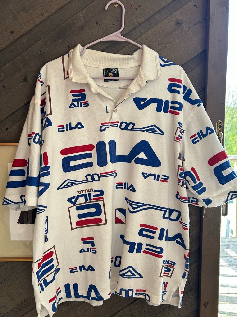 Vintage FILA Italia white polo with blue/red/brown logo print
